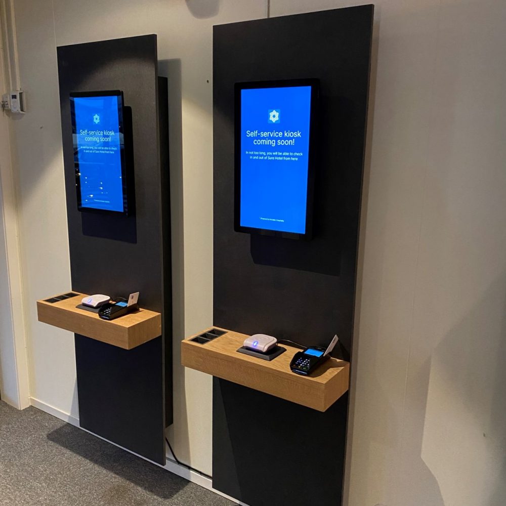 Two wall-mounted kiosks